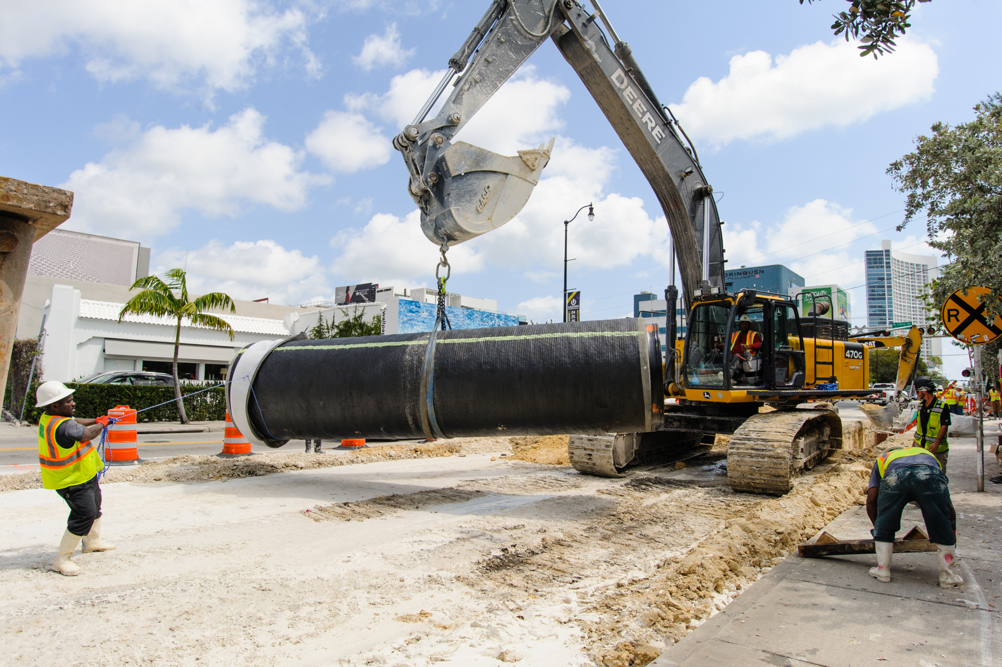 A Miami-Dade Water and Sewer Department crew, featured in the June issue, transports a piece of pipe for installation. Miami-Dade is the largest water and wastewater utility in the southeastern United States, serving 2.3 million people, plus thousands of daily visitors, and covering 400 square miles.