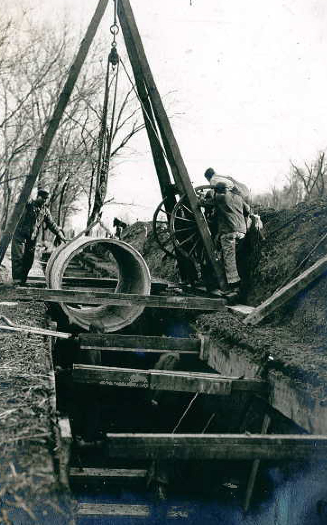 Crews install a 48-inch concrete pipe in Kansas City in 1916. About 600 miles of the city's 2,800-mile distribution system is more than 100 years old. (Photo by KC Water Services)